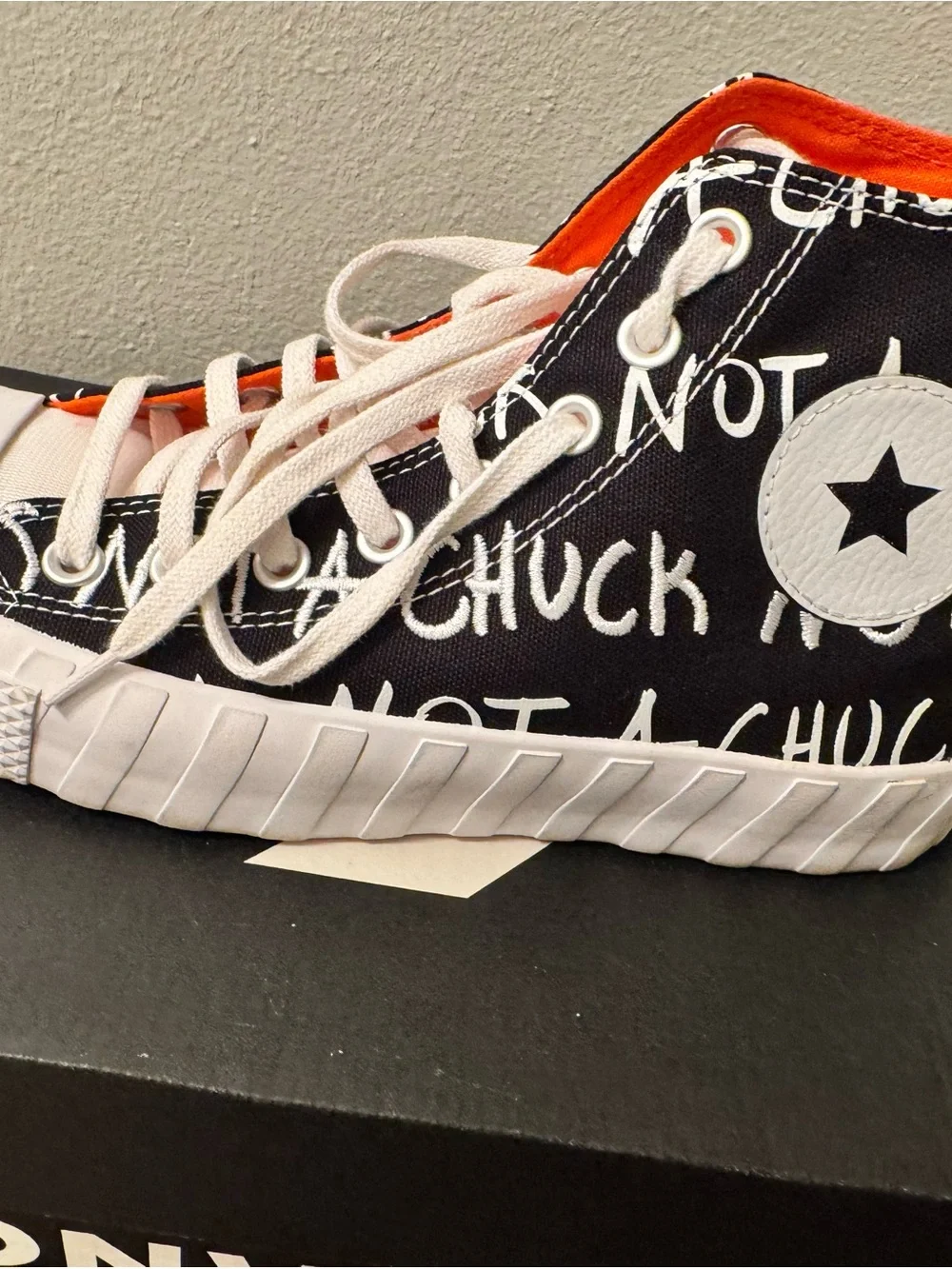 Converse High Top Sneaker in White, Black & Orange